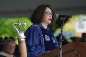 Board of Visitors Rector Heather Crislip '95 addresses the graduates. Photo by Suzanne Carr Rossi.