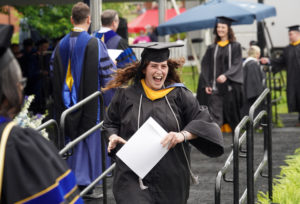 After receiving their diplomas, graduates from UMW's College of Arts and Sciences, College of Business and College of Education posed for photos. Photo by Suzanne Carr Rossi.