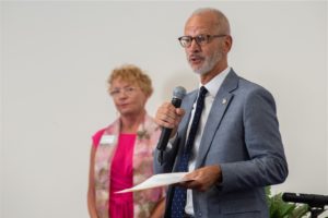 UMW President Troy Paino addresses the crowd during Monday's signing celebration for a new business pathway agreement between Mary Washington and Germanna Community College. Germanna President Janet Gullickson looks on. Photo by BC Photography.