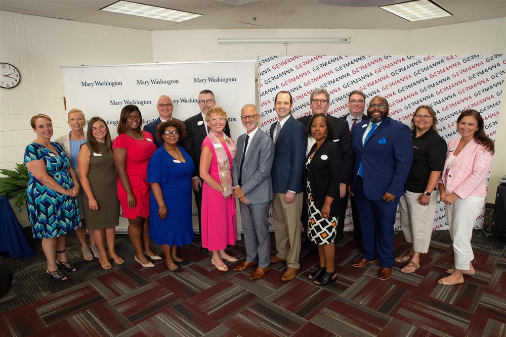A group of administrators from the University of Mary Washington and Germanna Community College who worked on the agreement pose during the signing celebration. Photo by BC Photography.