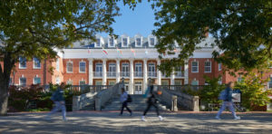 Students stroll past Lee Hall along Campus Walk at the University of Mary Washington.