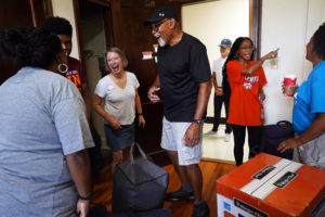 Kelly Paino, center, talks with, from left Ossie Furr, Brenston Furr Jr. and Brenston Furr Sr., during move-in day for daughter Jorja Furr, right. President Troy Paino, background, looks on. Photo by Suzanne Carr Rossi.