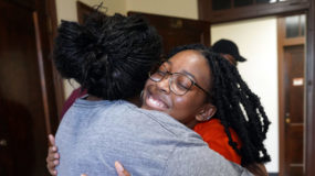 Jorja Furr, right, hugs mom Ossie Furr on move-in day. Photo by Suzanne Carr Rossi.