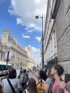 UMW students Gabriel Snider, Colin Walker and Sarah Sklar, Professor of Historic Preservation Andi Smith (in yellow), and UMW students Kelly Pratt, Elizabeth Goodloe, Eric Hummer and Jenna Gilbert gaze at the Sorbonne during this summer's 'UMW in Paris' trip. Photo courtesy of Andi Smith.