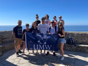 A group from this summer's 'UMW in Spain' trip poses at the top of San Juan de Gaztelugatxe. Front row, from left to right: Center for International Education Director Jose Sainz, and UMW students Liliana Ramirez, Jessica Oberlies, Marcelo Ruggiero, Tyler Ventura and Kaitlin Saal. Back row, from left to right: UMW students Hannah Stottlemyer, Jonan Sainz, Clare Lewis and Abigail Tank.