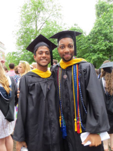 Edmonds (right) poses with Gibran Parvez '14, his three-year UMW roommate, at graduation. In college, said Professor of Economics Robert Rycroft, Edmonds' inquisitiveness stood out, as did his popularity, with Rycroft saying he was like "the mayor of Mary Washington."