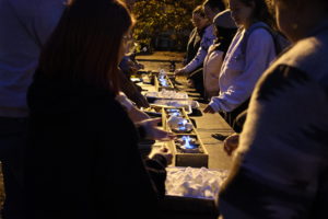 Students make s'mores at last week's Big Ash Bonfire and Campout, which lit up spirits on Ball Circle.