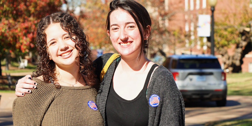 Students show their "I voted" stickers