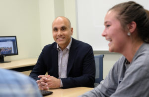 Professor of Communication Anand Rao talks with students. Rao is among several UMW faculty members exploring the use of ChatGPT in the classroom. Photo by Norm Shafer.