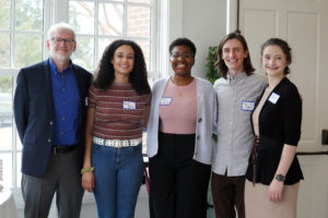 From left to right: UMW Professor of Geography Steve Hanna and Mary Washington students Josephine Allamby, Anaïs Malangu, John Liberty and Brooke Prevedel pose for a photo at the unveiling event for Fredericksburg's new civil rights trail. Faculty and students from the University's departments of historic preservation, history and American studies and geography helped with the project. The group pictured created the trail's maps. Photo by Suzanne Carr Rossi.