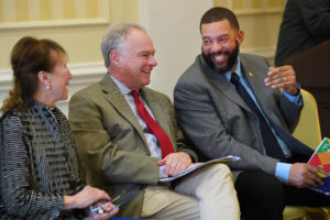 From left to right: Fredericksburg Mayor Mary Katherine Greenlaw laughs with U.S. Sen. Tim Kaine and Fredericksburg Vice Mayor Charlie Frye Jr. at the unveiling event, where each of the three addressed the crowd. Photo by Suzanne Carr Rossi.