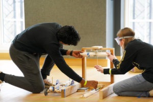 Kapil Kulkarni (left) and Lily Jacoby (right) prepare to launch their vehicle during the 'Scrambler' category during the regional Virginia Science Olympiad competition at UMW. Photo by Suzanne Carr Rossi.