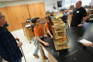 Noal Rod (left) and Diora Nabiyeva (right) prepare to compete in the "Roller Coaster" category at a Virginia Science Olympiad at the University of Mary Washington Saturday. The regional competition brought hundreds of fifth- through 12th-graders to campus. Photo by Suzanne Carr Rossi.