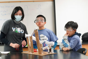 James Pijai (center) and Seungwoo Oh (right), fifth-graders from Kent Gardens Elementary School in McLean, Virginia, compete in the 'Roller Coaster' competition during the regional Virginia Science Olympiad event at the University of Mary Washington. Photo by Suzanne Carr Rossi.