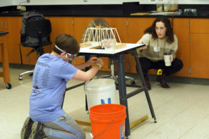 The 'Bridge' competition category had teams designing and constructing model bridges that were scrutinized by judges for their structural efficiency. Photo by Suzanne Carr Rossi.