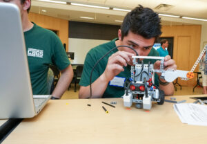 Aaron Sweeney of Chesapeake Bay Governor’s School (CBGS) makes adjustments to his team’s robot prior to competition at the Innovation Challenge @Dahlgren in April 2022. CBGS was one of 12 schools competing for $5,000 in cash prizes. (U.S. Navy photo/Released)