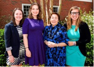 Irene Piscopo Rodgers poses with Mary Washington students Kelly McDaniel, Mary Hopkin and Emily Ferguson in 2017. The young women represent just a few of the many students who have benefitted through the years from Rodgers' generosity to her alma mater. Her final gift of $30 million - the largest ever received by the University - will be 'transformational' to UMW's undergraduate research program, providing students with invaluable hands-on learning opportunities for decades to come.