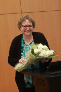 Kelli Slunt with flowers