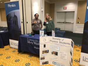 Swanson, posing for a photo here with UMW Assistant Physics Professor Varun Makhija, is president of UMW’s Society of Physics Students.