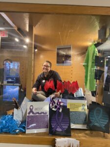 James Farmer Multicultural Center Associate Director Joanna Raucci joined took time for a fun photo while working on the exhibit. The display, Raucci said, is "a creative project that highlights the need for ongoing conversations about gender inclusivity and the fight for human rights."