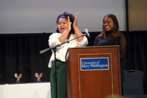 UMW seniors Miranda Colbert (left) and Aniya Stewart energized the crowd as hosts of the recent Eagle Awards ceremony, held in the Cedric Rucker University Center's Chandler Ballroom. Photo by Suzanne Carr Rossi.