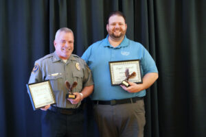 UMW Chief of Police Michael Hall and Assistant Director of Residence Life and Housing John Hughey received the In the Wings Award. Photo by Suzanne Carr Rossi.