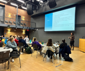 The Eagles Let's Talk program features sessions like this one on nutrition and aims to bring in a variety of experts to support student-athlete mental health. Here, Julie Schwartz, nutrition and fitness coach for Mind Your Own Coaching, speaks to the group.