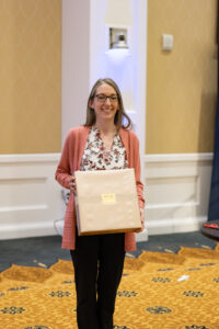 Academic Services Administrative and Office Specialist Allison Smith poses after receiving one of three Atkins Awards, presented to Mary Washington's "unsung heroes." Photo by Sam Cahill.