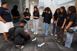 Prince William County Teachers for Tomorrow participants experiment with teaching toys outside Seacobeck Hall's fully equipped makerspace. Photo by Suzanne Carr Rossi.