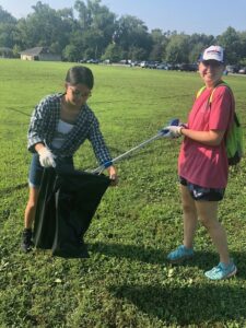 During her time at UMW, McLees (right) led teams of volunteers in efforts to pick up trash, do projects at the SPCA and more.