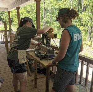 McLees (left) participated in three Habitat for Humanities trips, building and repairing houses, during her time at UMW.