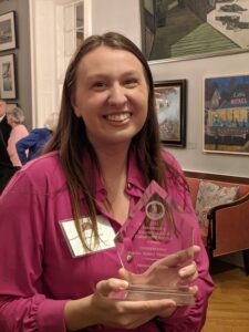 McLees poses with her award.