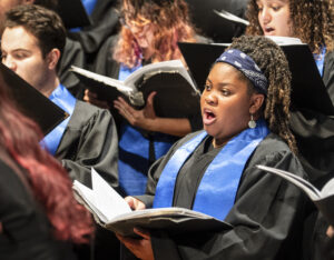 UMW student Margeaux Grey lends her voice to the performance. Photo by Tom Rothenberg.