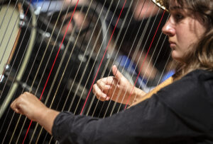 UMW student Adelaide Gill rehearses for the 'Two Roads Diverged' concert, to be held at UMW on Sunday, Nov. 12. Photo by Tom Rothenberg.