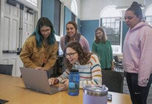Melissa Wells (far right) on the job teaching future educators at UMW's College of Education.