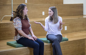 Melissa Wells (right) on the job teaching future educators at UMW's College of Education.