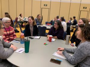 Faculty members share experiences and ideas during a talk earlier this month that addressed student mental health in the classroom.