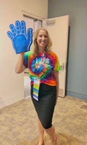 UMW alumna Sarah Ritchie ’14 welcomes school counselor attendees to her High Five to Kindness presentation at the Virginia School Counselors Association's annual conference in Hampton Roads.