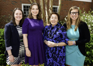 Irene Piscopo Rodgers '59 poses in 2017 with three of her recipients, Kelly McDaniel, Mary Hopkin and Emily Ferguson.