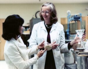 Anne Hope Scott (right) collaborates with a co-worker in an FDA lab. The 1959 alumna's bequest funded the Anne Hope Scott ’59 Scholarship in Chemistry.