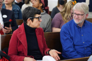 Professor of Historic Preservation Christine Henry and Professor of Geography Steve Hanna chat during the announcement event celebrating the Fredericksburg Civil Rights Trail's inclusion on the U.S. Civil Rights Trail. Together with several UMW students, Henry and Hanna contributed to the project, including research that led to maps and signage. Photo by Suzanne Carr Rossi.