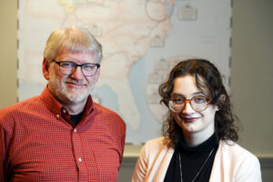 UMW Professor of Geography Steve Hanna and senior Brooke Prevedel made the map that's the focal point of a new Fredericksburg Area Museum exhibit commemorating the Marquis de Lafayette's 1824 visit to the U.S. The pair are co-authors of the map, with Prevedel taking top billing. Photo by Suzanne Carr Rossi.