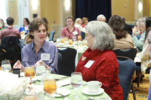 Senior Norah Walsh, recipient of the Rowe Family Journalism Scholarship and other awards, chats over lunch with her donor, Jeanette Cadwallender. Photo by Karen Pearlman.