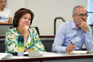 UMW business alums Linda Blakemore '84 and Lou Marmo '94 were among a panel of four judges at last week's Case Competition for business students. Photo by Suzanne Carr Rossi.