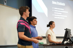 From left to right: Daniel Blanc, Thomas Martinez and Rachel Oestrike present during last week's Case Competition. The team placed second in the contest, taking home $1,000. Photo by Suzanne Carr Rossi.
