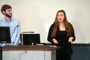 Brian Gaydos and Jenna Diehl answer the judges' questions following their presentation at the Case Competition. Photo by Suzanne Carr Rossi.