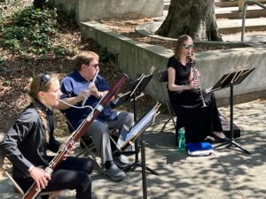 From left to right, Jemima Manton on bassoon, Doug Gately on flute and Madeline MacArthur on clarinet play during the recent ceremony for UMW students being inducted into the prestigious Phi Beta Kappa academic honor society.