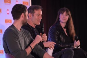 Maggie Lovitt '15, who earned a bachelor's degree in historic preservation, found success in a second career in entertainment journalism when the pandemic hit, showcasing the versatility of a public liberal arts and sciences education from UMW. Here, she interviews actors Matthew Lewis (left) and Jason Isaacs. Photo credit: FanExpo.