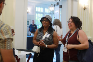 Alumni of all ages can enjoy themselves at a Virginia wine, beer and cider tasting at the Jepson Alumni Executive Center, while children enjoy a family movie under the supervision of UMW staff and students. Photo by Karen Pearlman.