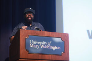 Chris Williams, who spearheaded the Fredericksburg Civil Rights Trail project with the City of Fredericksburg's Victoria Matthews, speaks at a UMW unveiling event for on-campus markers during the summer. Around that same time Williams also was inducted into the Recording Academy. Photo by Karen Pearlman.